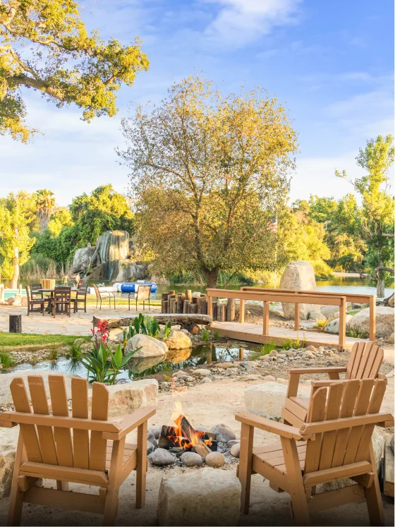 Relaxing lakeside fire pit seating area at a Kentina Hospitality destination in Temecula Valley wine country