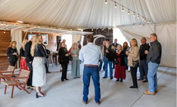 Guests attending a private event and social gathering inside an elegant covered venue at a Temecula Valley resort and hospitality destination